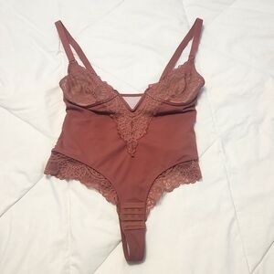 Brand new Hey Shape lace body suit